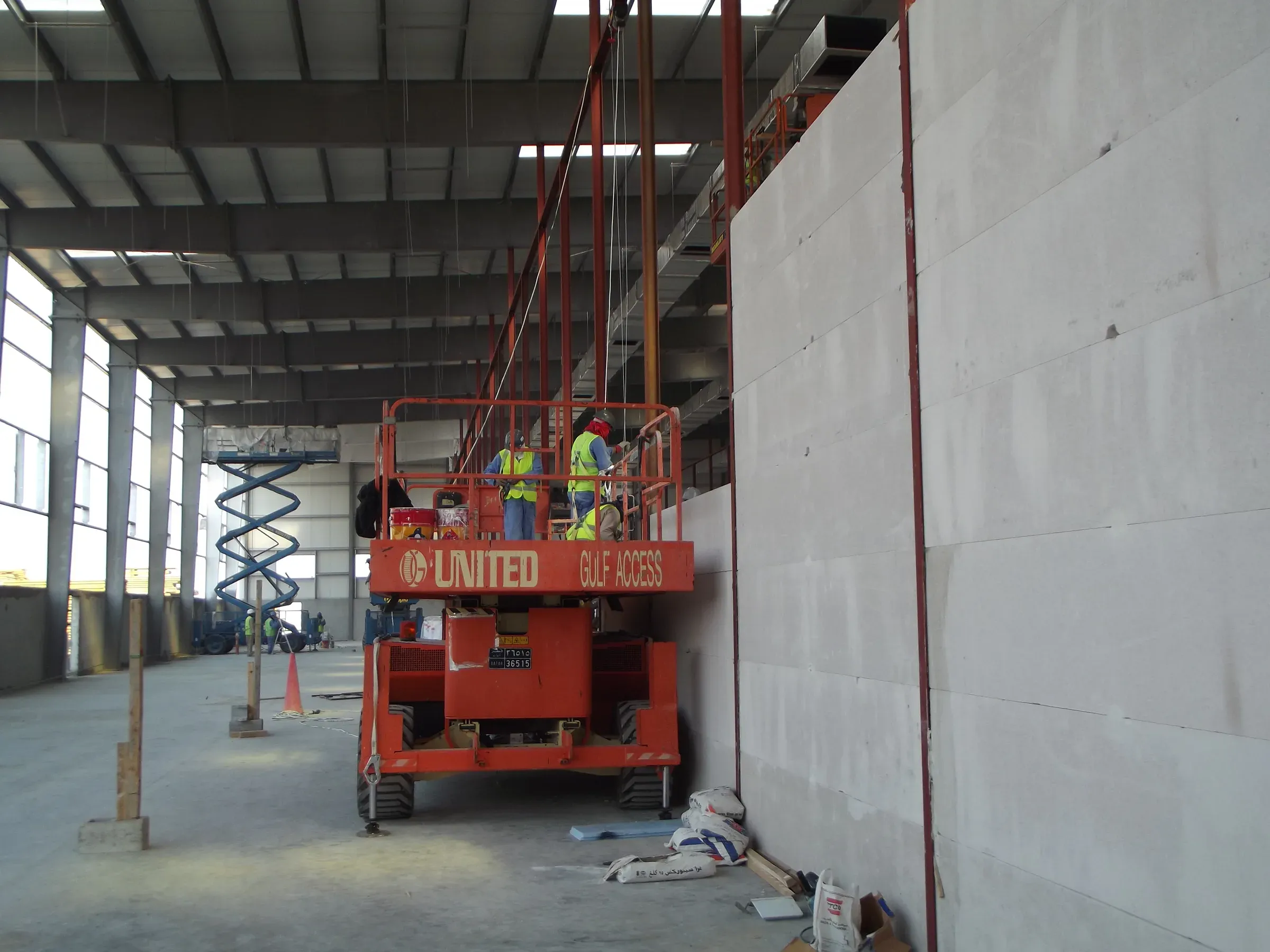 AAC partition panels going up in a steel warehouse frame