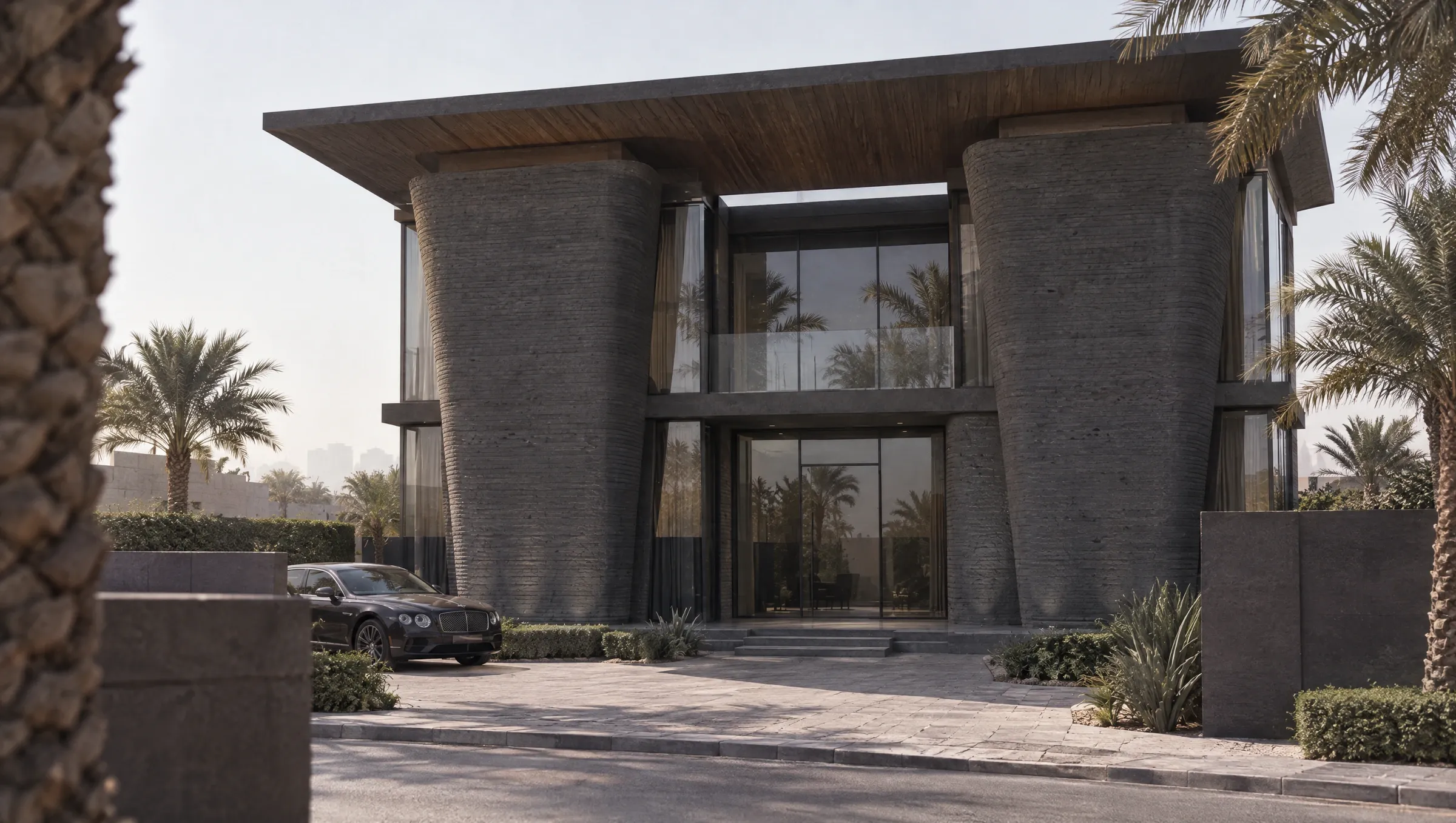 Villa concept with dark printed outer walls in the Volcanic Chic finish